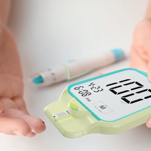 Blood Glucose Monitor in use